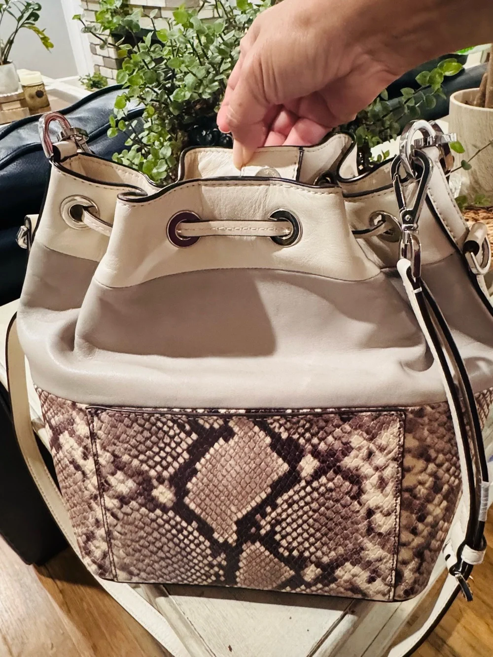 Michael Kors women’s White Drawstring Bucket Bag with Snake-Print Panel